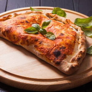 CALZONE (Sauce Tomate, Fromage, Viande Hachée ou Jambon)