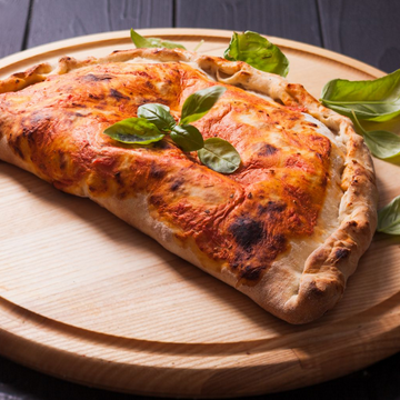 CALZONE (Sauce Tomate, Fromage, Viande Hachée ou Jambon)